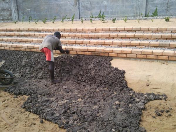 Lining the pond with clay